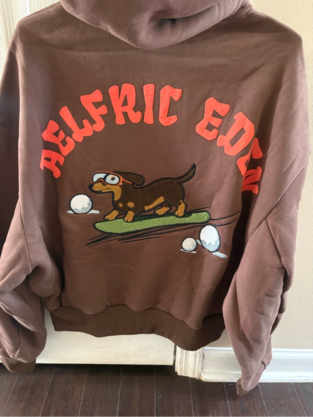 Aelfric Eden Brown Hoodie with Dachshund Surf Graphic and Coral Lettering Small